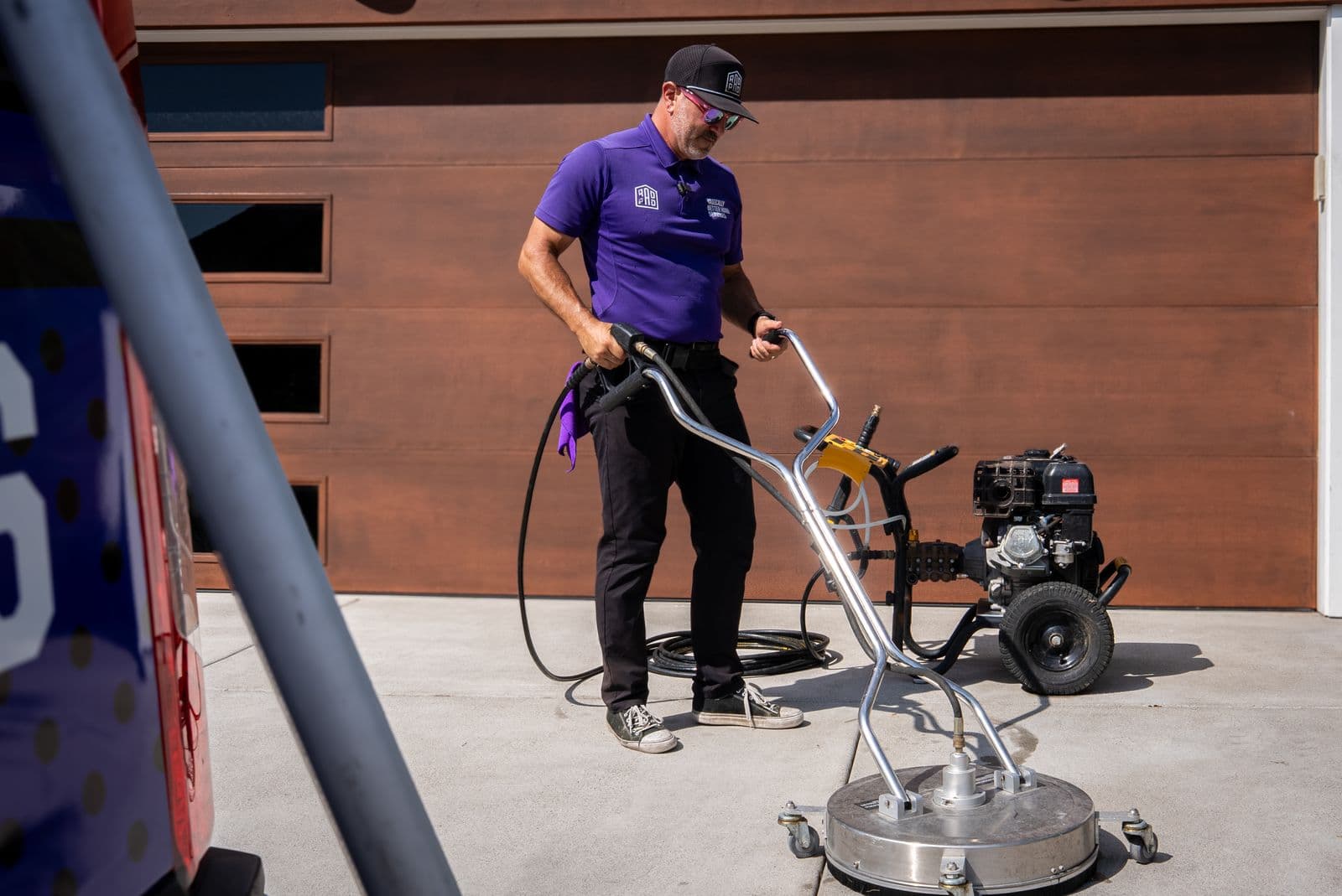 Rotary surface cleaning on a concrete driveway
